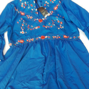 Blue dress with red, white, green floral print